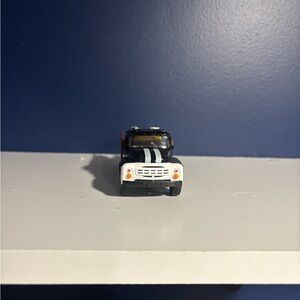 Miniature Black and White Toy Car